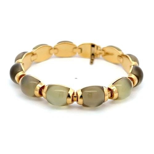 VINTAGE 18K YELLOW GOLD LINK BRACELET WITH 10X11.5 MM YELLOW MOONSTONES: VINTAGE 18K YELLOW GOLD LINK BRACELET WITH 10X11.5 MM YELLOW MOONSTONES VINTAGE 18K YELLOW GOLD LINK BRACELET WITH 10X11.5 MM YELLOW MOONSTONES PRODUCT DESCRIPTION Detailed Description: Embrace luxury