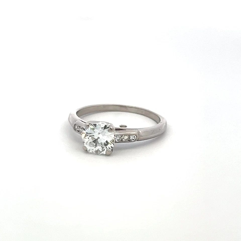TIFFANY & CO 1.16CT OLD MINER CUT DIAMOND PLATINUM VINTAGE ENGAGEMENT RING: TIFFANY & CO 1.16CT OLD MINER CUT DIAMOND PLATINUM VINTAGE ENGAGEMENT RING Designer: Tiffany & Co Title: This elegant Tiffany & Co vintage engagement ring showcases a stunning 1.04 carat Old Miner cut
