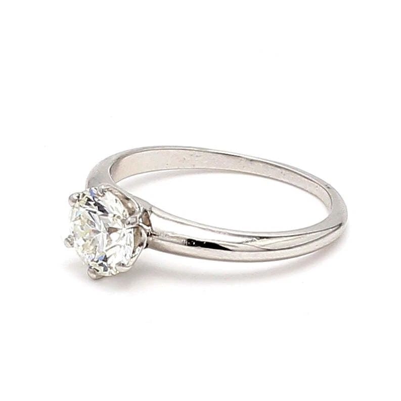 TIFFANY & CO.. 1.02 CARAT H-VS1 DIAMOND PLATINUM ENGAGEMENT RING: TIFFANY & CO.. 1.02 CARAT H-VS1 DIAMOND PLATINUM ENGAGEMENT RING Title: Tiffany and Co 1.02 Carat Round Brilliant Shape H-VS1 Diamond Platinum Engagement Ring Style: Engagement Metal: Platinum Gemston