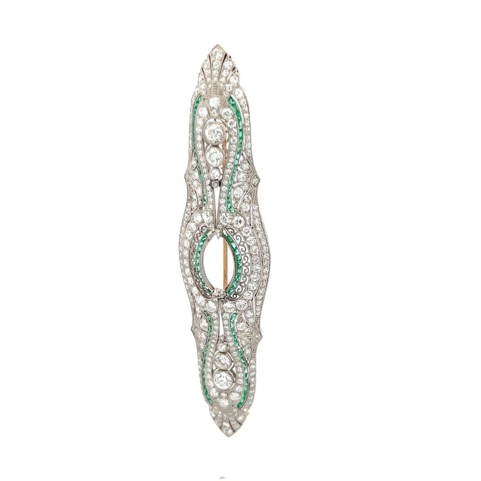 TIFFANY & CO 6.00 CARAT ROUND DIAMOND 1.50 CARAT EMERALD PLATINUM PIN: PRODUCT DESCRIPTION Designer: Tiffany & Co Title: Tiffany & Co 6.00 Carat Round Brilliant H VS Diamond 1.50 Carat Cushion Brilliant Emerald Platinum Pin Metal: Platinum Gemstone 1: 4.5 Carat Diamond N