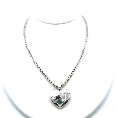 CHOPARD 0.50CT TOURMALINE & 0.20CT DIAMOND HEART PENDANT IN 18K WHITE GOLD: CHOPARD 0.50CT TOURMALINE & 0.20CT DIAMOND HEART PENDANT IN 18K WHITE GOLD PRODUCT DESCRIPTION Designer: CHOPARD Title: Chopard 0.50 Carat Heart Shape Tourmaline 0.20 Carat Round Brilliant G VS Diamon