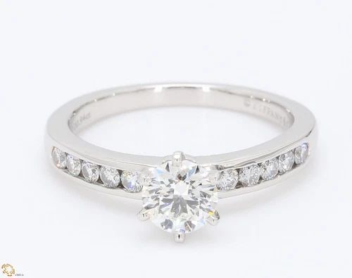 TIFFANY & CO.. 0.94 CARAT G-VS1 PLATINUM ENGAGEMENT RING DIAMOND (1 of 1)