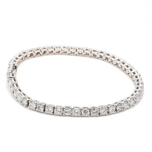 6.51 CARAT ROUND BRILLIANT DIAMOND 14K WHITE GOLD CLASSIC TENNIS BRACELET: 6.51 CARAT ROUND BRILLIANT DIAMOND 14K WHITE GOLD CLASSIC TENNIS BRACELET Title: This elegant 6.51 carat diamond tennis bracelet is crafted in gleaming 14K white gold and features 51 perfectly matched
