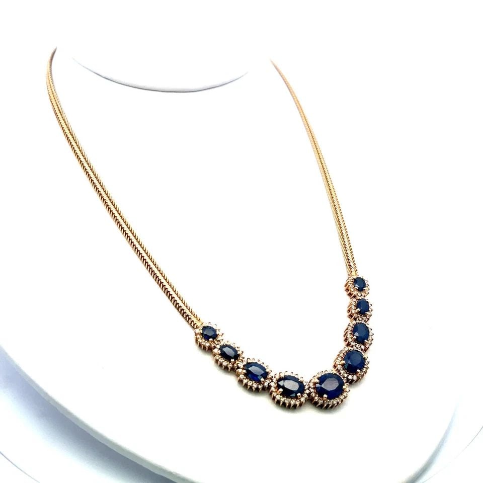 18K YG STATION NECKLACE WITH 1.5 CARAT ROUND DIAMONDS & 9.5 CARAT SAPPHIRES: 18K YG STATION NECKLACE WITH 1.5 CARAT ROUND DIAMONDS & 9.5 CARAT SAPPHIRES 18K YG STATION NECKLACE WITH 1.5 CARAT ROUND DIAMONDS & 9.5 CARAT SAPPHIRES PRODUCT DESCRIPTION Detailed Description: Elevat