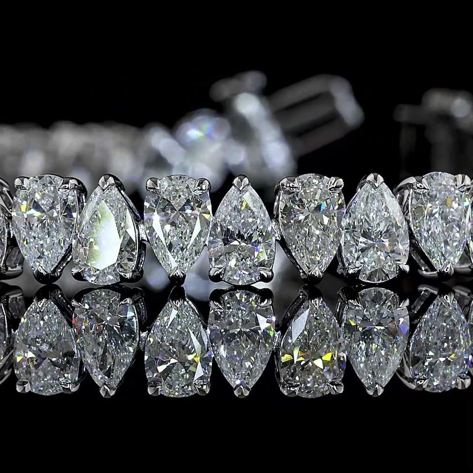 LAB-GROWN 12.31 CARAT PEAR E-F-VS1 DIAMOND 14K WHITE GOLD TENNIS BRACELET: LAB-GROWN 12.31 CARAT PEAR E-F-VS1 DIAMOND 14K WHITE GOLD TENNIS BRACELET Title: High-quality Brand-New Echo Friendly Elegant Lab-Grown 12.31 Carat Pear E-F-VS1 Diamond 14K White Gold Tennis Bracelet 