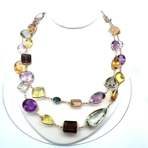 VIBRANT 18 KARAT YELLOW GOLD MULTI-GEMSTONE NECKLACE 84.3 GRAMS 41 INCH LONG: VIBRANT 18 KARAT YELLOW GOLD MULTI-GEMSTONE NECKLACE 84.3 GRAMS 41 INCH LONG Detailed Description: Embrace the allure of vintage elegance with this stunning multi-gemstone necklace. Crafted in luxurio
