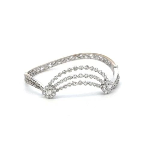 VINTAGE 18K WHITE GOLD BANGLE BRACELET WITH 3.4 CARAT ROUND & BAGUETTE DIAMONDS: VINTAGE 18K WHITE GOLD BANGLE BRACELET WITH 3.4 CARAT ROUND & BAGUETTE DIAMONDS VINTAGE 18K WHITE GOLD BANGLE BRACELET WITH 3.4 CARAT ROUND & BAGUETTE DIAMONDS PRODUCT DESCRIPTION Detailed Description