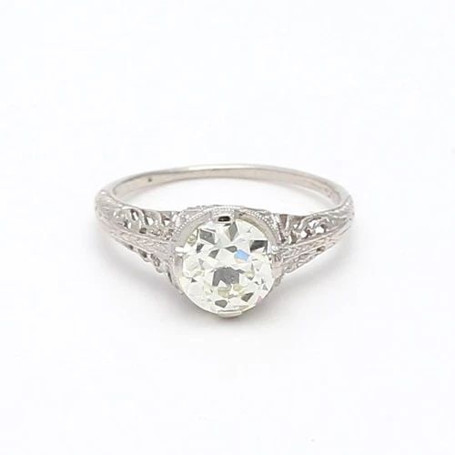 1.36 CARAT CIRCULAR BRILLIANT CUT SHAPE N-I1 DIAMOND PLATINUM WEDDING RING (1 of 2)
