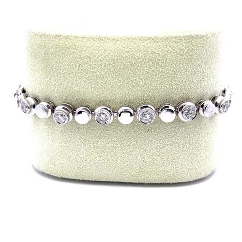 VINTAGE 18K WHITE GOLD TENNIS BRACELET WITH 3.5 CARAT ROUND I-SI1 DIAMONDS: VINTAGE 18K WHITE GOLD TENNIS BRACELET WITH 3.5 CARAT ROUND I-SI1 DIAMONDS VINTAGE 18K WHITE GOLD TENNIS BRACELET WITH 3.5 CARAT ROUND I-SI1 DIAMONDS PRODUCT DESCRIPTION Video: Video Link Detailed Des