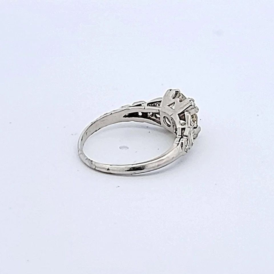 1.55 CARAT OLD EUROPEAN CUT M-VS2 DIAMOND PLATINUM ART DECO RING: 1.55 CARAT OLD EUROPEAN CUT M-VS2 DIAMOND PLATINUM ART DECO RING Title: 1.55 Carat Old European Cut M-VS2 Diamond Platinum Art Deco Ring Style: Art Deco Metal: Platinum Gemstone 1: 0.15 Carat Diamond 
