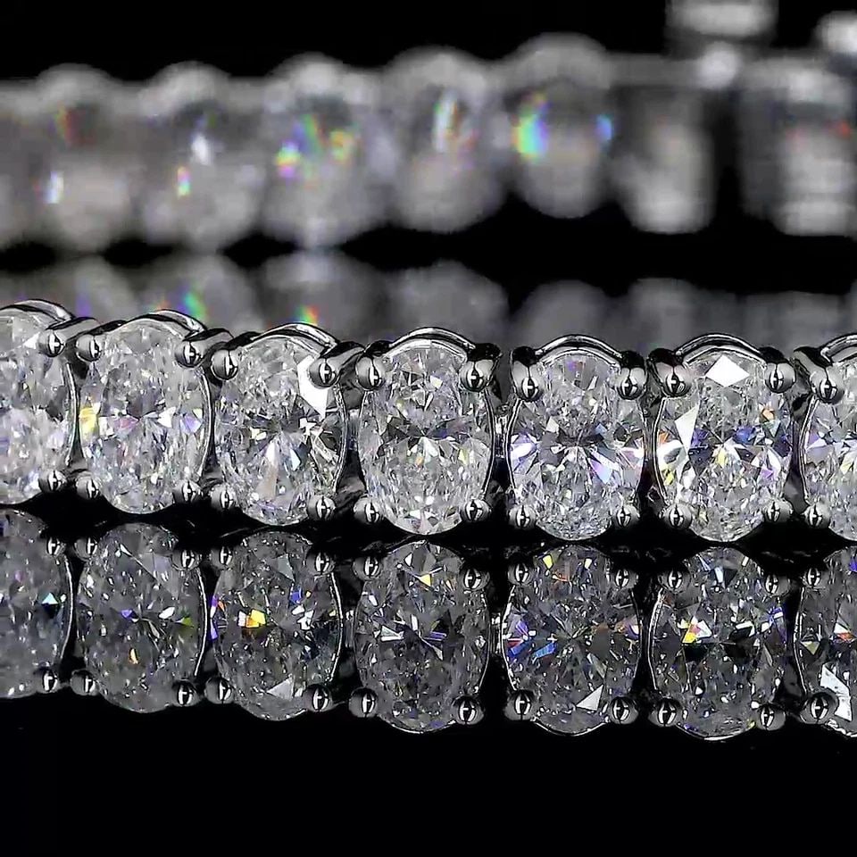 LAB-GROWN 7 CARAT OVAL F-VS2 DIAMOND 14K WHITE GOLD TENNIS BRACELET: LAB-GROWN 7 CARAT OVAL F-VS2 DIAMOND 14K WHITE GOLD TENNIS BRACELET Lab-Grown 7 Carat Oval F-VS2 Diamond 14K White Gold Tennis Bracelet Details Department Unisex Adults Main Stone No Stone Metal White