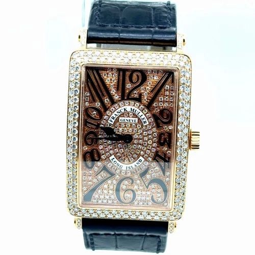 FRANCK MULLER 18K GOLD AND PAVE DIAMOND WATCH REF. 1002 QZ NO.56: FRANCK MULLER 18K GOLD AND PAVE DIAMOND WATCH REF. 1002 QZ NO.56 Franck Muller 18k and Diamond Long Island Ref. 1002 QZ #56 31mmx51.8mm Quartz Movement 3.00 A/m Rare Timepiece This all 18k Yellow Gold