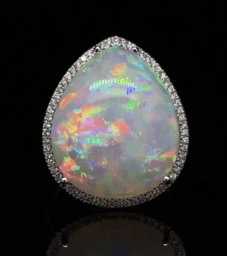 EXQUISITE 16.82-CARAT ETHIOPIAN OPAL RING IN 14K WHITE GOLD WITH A DIAMOND HALO (1 of 2)