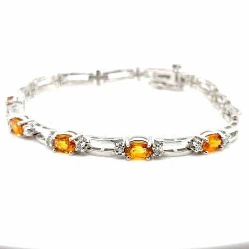 CITRINE & DIAMOND BRACELET IN 14K WHITE GOLD WITH APPROX. 2.5CTS OF CITRINE: CITRINE & DIAMOND BRACELET IN 14K WHITE GOLD WITH APPROX. 2.5CTS OF CITRINE This stunning bracelet features approximately 2 5 carats of natural orange citrine and 10 round brilliant diamonds set in 14