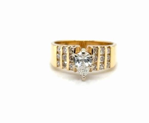 .515CT PEAR CUT DIAMOND RING IN 14K YELLOW GOLD WITH DIAMOND ACCENTS (1 of 2)
