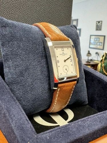BAUME AND MERCIER HAMPTON WATCH, REFERENCE MVO45063, LADIES WRIST WATCH: BAUME AND MERCIER HAMPTON WATCH, REFERENCE MVO45063, LADIES WRIST WATCH Baume & Mercier Hampton Reference: MV045063 Midsize Tank Style Watch Stainless Steel Case Approximately 31 x 25 mm (not includin