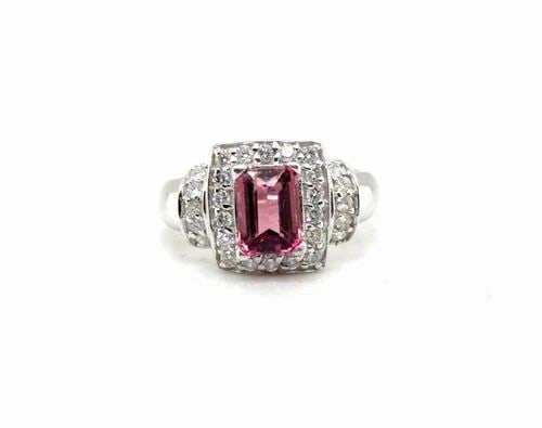 1CT PINK TOURMALINE AND 0.35CT TW DIAMOND RING IN 14K WHITE GOLD: 1CT PINK TOURMALINE AND 0.35CT TW DIAMOND RING IN 14K WHITE GOLD Elevate your look with this stunning cocktail ring crafted in 14K white gold Featuring a captivating 1ct pink tourmaline as the centerp