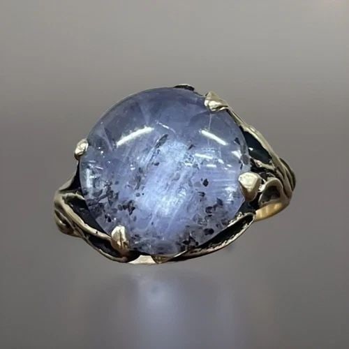LAVENDER STAR SAPPHIRE ESTATE RING IN 14KT YELLOW GOLD: LAVENDER STAR SAPPHIRE ESTATE RING IN 14KT YELLOW GOLD Lavender Star Sapphire The center stone is approximately 9 carats total weight. (12mm width) Lovely and Elegant Estate Ring 14kt Yellow Gold with