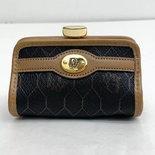 AUTHENTIC CHRISTIAN DIOR VINTAGE LEATHER COIN CASE BLACK TAN GOLD PLATED CLIP: AUTHENTIC CHRISTIAN DIOR VINTAGE LEATHER COIN CASE BLACK TAN GOLD PLATED CLIP Christian Dior Clip Closure Width: 9.5 cm Height: 6.0 cm Depth: 5.5 cm Black, Tan, Gold Gold Plated, Leather, Canvas Manuf