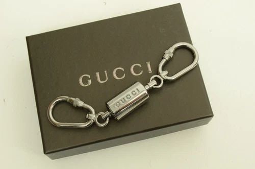 AUTHENTIC GUCCI SILVER PLATED CHROME FINISH TWIST CYLINDER KEYCHAIN ACCESSORY (1 of 2)