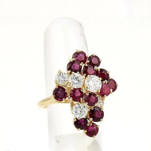 DIAMONDS GEMSTONE GOLD RING 18K YELLOW COCKTAIL STYLE: DIAMONDS GEMSTONE GOLD RING 18K YELLOW COCKTAIL STYLE This 18k Yellow Gold Cluster Cocktail Ring features stunning round-cut white diamonds , surrounded by a cluster of gemstones for a festive and ele