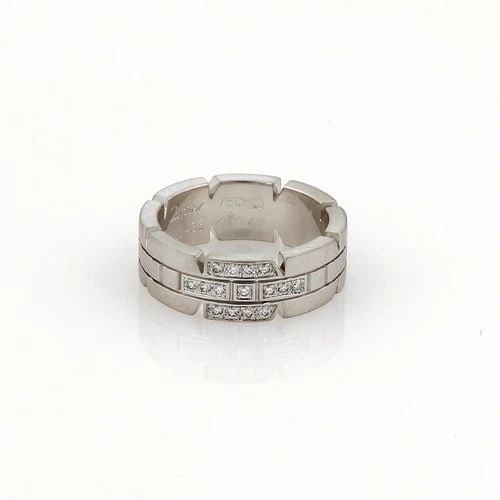 CARTIER DIAMOND GOLD RING 18K WHITE TANK FRANCHAISE BAND 4: CARTIER DIAMOND GOLD RING 18K WHITE TANK FRANCHAISE BAND 4 The Cartier Diamond Ring is a stunning piece of fine jewelry crafted from 18k white gold, featuring a round diamonds. The band style and simp