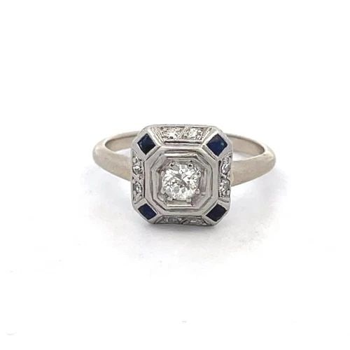 DIAMOND PLATINUM ART DECO 13K WHITE GOLD RING: DIAMOND PLATINUM ART DECO 13K WHITE GOLD RING This is a beautiful Art Deco ring, it is 13k white gold with platinum. The center of the ring show a small octagon shape with a round cut diamond and the 
