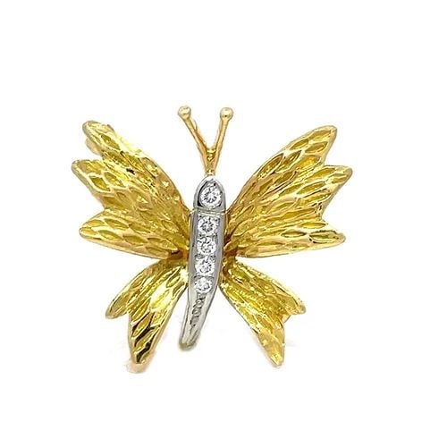 TIFFANY & CO. BUTTERFLY BROOCH DIAMOND 18K GOLD PLATINUM W/POUCH: TIFFANY & CO. BUTTERFLY BROOCH DIAMOND 18K GOLD PLATINUM W/POUCH These adorable authentic small brooch is from Tiffany & Co. It is crafted from 18k yellow gold with platinum accent featuring textured 