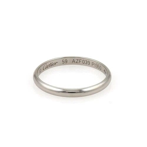 CARTIER RING PLATINUM 2.5MM WIDE PLAIN DOME WEDDING BAND SIZE 59-US 9 W/CERT: The Cartier Platinum 2.5mm Wide Plain Dome Wedding Band is a luxurious and elegant piece of fine jewelry. This ring is crafted from 950 platinum with a polished white finish, making it a timeless and 