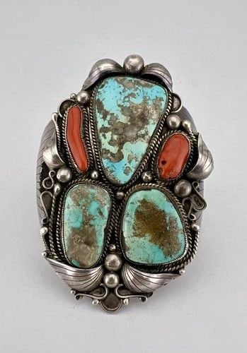 HUGE NAVAJO STERLING SILVER FOX TURQUOISE & CORAL STAMPED CUFF BRACELET 121.5G: MASSIVE Navajo Sterling Silver Fox Turquoise & Coral Stamped Cuff Bracelet 121.5g Cuff is 5 1/4" tip to Tip and has a 1 1/4" Wide Slightly Adjustable Gap Cuff Is Just Over 3 1/2" Wide In the Center We