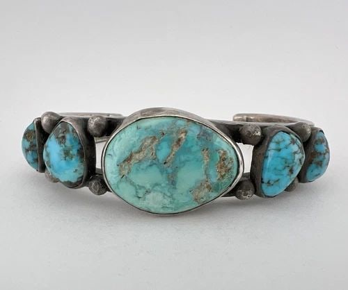 EARLY VTG NAVAJO COIN SILVER LONE MOUNTAIN TURQUOISE INGOT CUFF BRACELET 57G: Early Vtg Navajo Coin Silver LONE MOUNTAIN Turquoise Ingot Cuff Bracelet 57g Cuff is 5 1/8" tip to Tip and has a Slightly Over 1 1/4" Wide Gap - Can Be Adjusted Slightly Cuff Is 7/8" Wide In the Cente