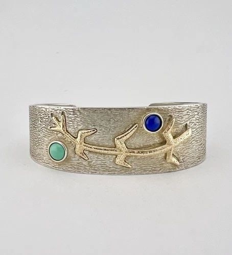ANDREW REDHORSE ALVAREZ NAVAJO STERLING SILVER & 14K CORNSTALK CUFF BRACELET: RARE Andrew Redhorse Alvarez Navajo Sandcast Sterling Silver & 14k Gold Cornstalk Cuff Bracelet Cuff is 5 1/2" tip to Tip and has a 1 1/4" Wide Gap Cuff Is 7/8" Wide In the Center Weight is 60.5 Grams