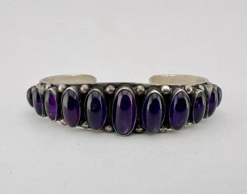 RARE LEO FEENEY STERLING SILVER NATURAL PURPLE AMETHYST STAMPED CUFF BRACELET: RARE LEO FEENEY STERLING SILVER NATURAL PURPLE AMETHYST STAMPED CUFF BRACELET RARE Leo Feeney Sterling Silver Natural Purple Amethyst Stamped Cuff Bracelet Cuff is 5 5/8" tip to Tip and has a 1" Wide 