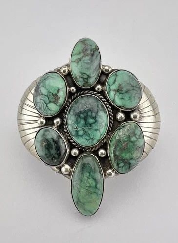 VINTAGE NAVAJO STERLING SILVER VARISCITE DAMELE STAMPED 2.5" WIDE CUFF BRACELET: VINTAGE NAVAJO STERLING SILVER VARISCITE DAMELE STAMPED 2.5" WIDE CUFF BRACELET Vintage Navajo Sterling Silver Variscite Damele Stamped 2.5" Wide Cuff Bracelet MEASUREMENTS: 5 1/8" Tip to Tip & Has a 