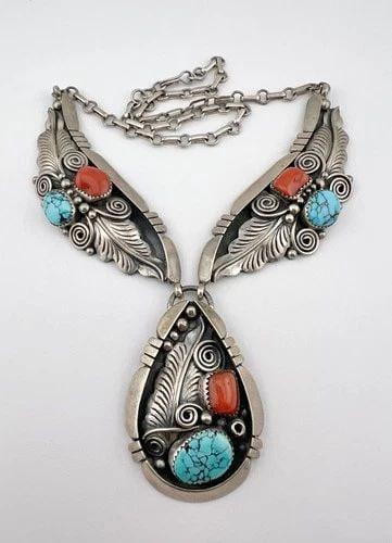VTG JUAN MARTINEZ ZUNI STERLING SILVER TURQUOISE CORAL BIB COLLAR NECKLACE 76.5G: HUGE Juan Martinez Zuni Sterling Silver Turquoise Coral Stamped Bib Collar Necklace 76.5g MEASUREMENTS: Necklace measures 18.5" tip To tip Center Pendant is 2 1/8" Tall By Just Under 1 1/2" Wide WEIGH