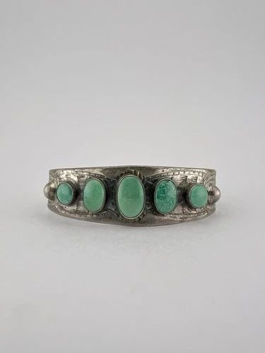 OLD PAWN NAVAJO STERLING SILVER CERRILLOS TURQUOISE STAMPED CUFF BRACELET 27G: OLD Pawn Navajo Sterling Silver Cerrillos Turquoise Stamped Cuff Bracelet 27g Cuff is Just Over 5 1/4" tip to Tip and has a 1 1/8" Wide Gap Cuff Is 3/4" Wide In the Center Weight is 27.2 Grams on my s