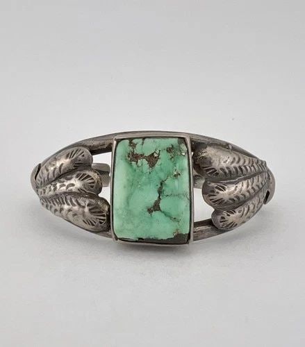 OLD PAWN NAVAJO COIN SILVER WEBBED CERRILLOS TURQUOISE STAMPED CUFF BRACELET: Old Pawn Navajo Coin Silver Webbed Cerrillos Turquoise Stamped Cuff Bracelet Cuff is 5 1/4" tip to Tip and has a 1" Wide - Slightly Adjustable Gap Cuff Is 1" Wide In the Center Weight is 34.5 Grams on