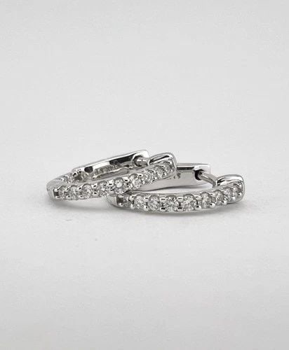 DESIGNER 14K WHITE GOLD .24TCW DIAMOND INSIDE OUT HUGGIE 1/2" HOOP POST EARRINGS: Designer 14K White Gold .24tcw Diamond Inside Out Huggie 1/2" Hoop Post Earrings Size: A Tad Over 1/2" Tall & Face Of The Earrings Are Around 1.5mm Wide Total Weight is 2.6 Grams on my scale Metal: 14