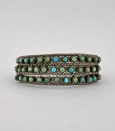 OLD 1940'S ZUNI STERLING SILVER TURQUOISE 3 ROW SNAKE EYE STAMPED CUFF BRACELET: OLD 1940's Zuni Sterling Silver Turquoise 3 Row Snake Eye Stamped Cuff Bracelet Cuff is 5" tip to Tip and has a 1" Wide - Slightly Adjustable Gap Cuff Is 3/4" Wide In The Center Weight is 21.7 Grams o