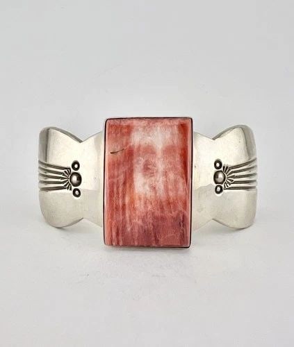 CHARLIE BOWIE NAVAJO STERLING SILVER RED/PURPLE SPINY OYSTER SHELL CUFF BRACELET: Charlie Bowie Navajo Sterling Silver Red/Purple Spiny Oyster Shell Cuff Bracelet Cuff is 5 3/8" tip to Tip and has a 1 1/8" Wide Adjustable Gap Cuff Is About 1 1/4" Wide In the Center Weight is 68.9 G