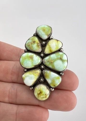 HUGE NAVAJO STERLING SILVER HIGH GRADE SONORAN GOLD TURQUOISE CLUSTER RING 2.25": HUGE Navajo Sterling Silver High Grade Sonoran Gold Turquoise Cluster Ring 2.25" Ring Size: 9 - Can Be Re Sized Weight is 27.9 Grams on my scale Metal: Sterling Silver Ring is Over 2 1/4" Tall In the 