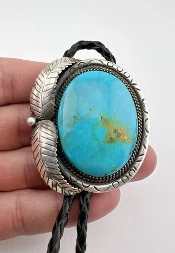 VTG NAVAJO STERLING SILVER BLUE GEM TURQUOISE STAMPED FEATHER OVAL BOLO TIE 2": VTG NAVAJO STERLING SILVER BLUE GEM TURQUOISE STAMPED FEATHER OVAL BOLO TIE 2" Vtg Navajo Sterling Silver Blue Gem Turquoise Stamped Feather Oval Bolo Tie 2" Size: 2" Tall by Over 1 3/4" Wide Weight i