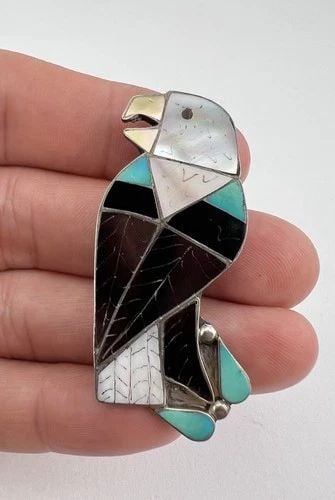 VTG ZUNI CARLENE LEEKITY STERLING SILVER FLUSH INLAY EAGLE PIN PENDANT 2 1/8": Vtg Zuni CARLENE LEEKITY Sterling Silver Flush Inlay EAGLE Pin Pendant 2 1/8" Size: 1" Wide By 2 1/8" Tall Metal: Sterling Silver Weight is 7.0 Grams on my scale Artist Signed: CARLENE LEEKITY Can be 