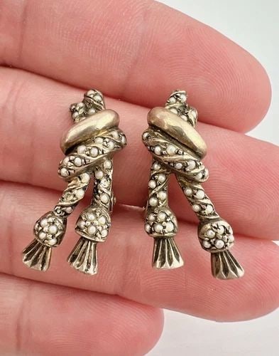 ANTIQUE VICTORIAN GERMANY GILT SILVER & SEED PEARL KNOTT TASSEL CLIP EARRINGS: ANTIQUE VICTORIAN GERMANY GILT SILVER & SEED PEARL KNOTT TASSEL CLIP EARRINGS Antique Victorian Germany Gilt Silver & Seed Pearl Knott Tassel Clip Earrings 1 1/8" Size: 1 1/8" Tall By 1/2" Wide At The