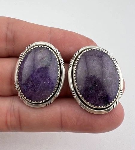 VTG JOHNSON NAVAJO STERLING SILVER NATURAL CHAROITE STAMPED OVAL POST EARRINGS: VTG JOHNSON NAVAJO STERLING SILVER NATURAL CHAROITE STAMPED OVAL POST EARRINGS Vtg Johnson Navajo Sterling Silver Natural Charoite Stamped Oval Post Earrings Size: 1 1/4" Tall & 1" Wide Weight is 16.3