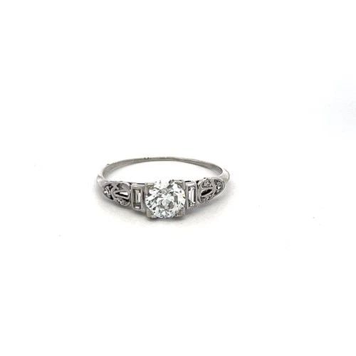 VINTAGE PLATINUM RING WITH 0.7 CARAT OLD EUROPEAN CUT GIA DIAMOND: VINTAGE PLATINUM RING WITH 0.7 CARAT OLD EUROPEAN CUT DIAMOND Detailed Description: Experience timeless elegance with this vintage platinum engagement ring. Featuring a 0.7-carat old European cut diam