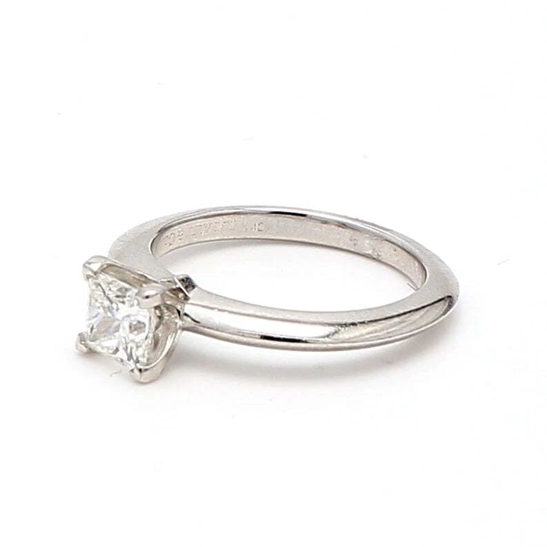TIFFANY & CO.. 0.55 CARAT H-VS1 DIAMOND PLATINUM ENGAGEMENT RING: TIFFANY & CO.. 0.55 CARAT H-VS1 DIAMOND PLATINUM ENGAGEMENT RING Tiffany & Co. Tiffany & Co.. 0.55 Carat H-VS1 Diamond Platinum Engagement Ring Details Department Unisex Adults Main Stone Diamond Meta