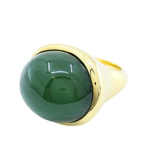 TIFFANY & CO. ELSA PERETTI 18K GOLD JADE CABOCHON DOME RING: TIFFANY & CO. ELSA PERETTI 18K GOLD JADE CABOCHON DOME RING DESIGNER: Elsa Peretti for Tiffany & Co. CIRCA: 1990’s MATERIALS: 18k Yellow Gold WEIGHT: 22.1 Grams MEASUREMENTS: 5/8" x ¾" RING S