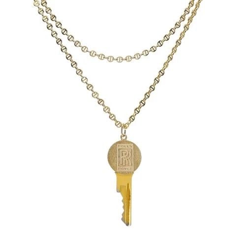 VINTAGE CARTIER 14K GOLD ROLLS-ROYCE KEY PENDANT NECKLACE: VINTAGE CARTIER 14K GOLD ROLLS-ROYCE KEY PENDANT NECKLACE ES IUTO Product details: Designer: Cartier Materials: 14k Gold Weight: Pendant - 11.6 Grams, Chain - 16.2 Grams Measurement: Pendant - 2" x 13