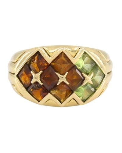 BVLGARI BULGARI GEMSTONE 18K GOLD COCKTAIL RING: BVLGARI BULGARI GEMSTONE 18K GOLD COCKTAIL RING NS NGTO This Bulgari ring features a geometric arrangement of the gemstones set in 18k yellow gold. The design is built around a series of lozenge-shape